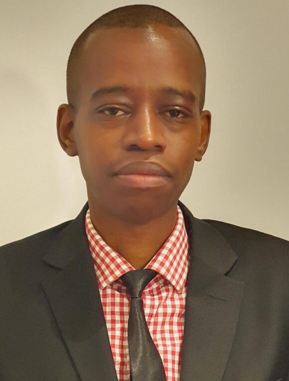 Dr. John Mwangi, Head of Research